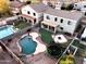 Backyard featuring an inviting pool, green lawn, and plenty of space for outdoor activities at 1677 E Heather Dr, San Tan Valley, AZ 85140