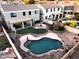 Backyard with a custom pool, lush greenery, and ample space for relaxation and entertainment at 1677 E Heather Dr, San Tan Valley, AZ 85140