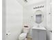 Powder room featuring a modern vanity, mirror, and toilet at 1677 E Heather Dr, San Tan Valley, AZ 85140