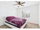 Bedroom featuring queen bed, ceiling fan, and view from the window at 1677 E Heather Dr, San Tan Valley, AZ 85140