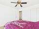 Bedroom featuring queen bed, ceiling fan, and closet at 1677 E Heather Dr, San Tan Valley, AZ 85140