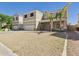 Charming two-story home featuring a two-car garage and drought-tolerant landscaping at 1677 E Heather Dr, San Tan Valley, AZ 85140