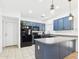 Modern kitchen with stainless steel appliances and ample counter space at 1677 E Heather Dr, San Tan Valley, AZ 85140