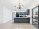 Eat-in kitchen featuring stainless steel appliances, tile flooring, and abundant natural light at 1677 E Heather Dr, San Tan Valley, AZ 85140