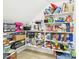 Pantry with plenty of shelves fully stocked with various cooking essentials at 1677 E Heather Dr, San Tan Valley, AZ 85140