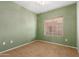 Inviting bedroom with neutral tones, carpet flooring, and natural light at 16825 N 14Th St # 125, Phoenix, AZ 85022