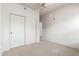 Bedroom with carpet flooring and closet with bi-fold doors at 16825 N 14Th St # 125, Phoenix, AZ 85022
