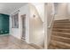 Hallway featuring neutral tones, tile flooring and a carpeted stairway at 16825 N 14Th St # 125, Phoenix, AZ 85022