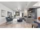 Bright living room featuring contemporary furnishings, ceiling fan, neutral walls and tile flooring at 16825 N 14Th St # 125, Phoenix, AZ 85022