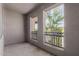 Relaxing covered patio with wrought iron railing and views of the surrounding greenery at 16825 N 14Th St # 125, Phoenix, AZ 85022