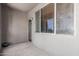 Covered patio features door to inside, and large window for natural light at 16825 N 14Th St # 125, Phoenix, AZ 85022