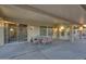 Inviting covered patio featuring an outdoor seating area, seamlessly blending indoor and outdoor living at 16927 W Desert Blossom Way, Surprise, AZ 85387