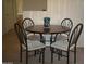 Dining area with round table and four chairs at 18416 N Cave Creek Rd # 1053, Phoenix, AZ 85032