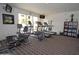 Exercise room with treadmills, bikes, weights, and entertainment at 18416 N Cave Creek Rd # 1053, Phoenix, AZ 85032