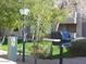 Outdoor BBQ grilling area with a grill, small trees, and a light pole at 18416 N Cave Creek Rd # 1053, Phoenix, AZ 85032