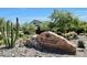 Community Center entrance sign surrounded by desert vegetation and clear blue skies at 18552 N 94Th St, Scottsdale, AZ 85255