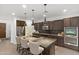 Well-equipped kitchen with center island, stainless appliances, and ample counter space at 18552 N 94Th St, Scottsdale, AZ 85255