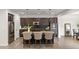 Modern kitchen with granite countertops, stainless steel appliances, and a large island at 18552 N 94Th St, Scottsdale, AZ 85255