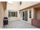 Charming patio with stone pavers and gas grill for outdoor entertaining at 18552 N 94Th St, Scottsdale, AZ 85255