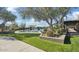 Relaxing pool area features chaise lounges, landscaping, and shaded ramada at 18552 N 94Th St, Scottsdale, AZ 85255