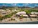 Beautiful home with well-maintained landscaping, a circular driveway, and a two-car garage at 1922 E Saltsage Dr, Phoenix, AZ 85048