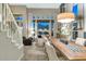 Spacious living and dining area with large windows and elegant decor at 1922 E Saltsage Dr, Phoenix, AZ 85048