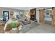 Inviting living room features fireplace and sliding barn doors to the adjoining room at 1922 E Saltsage Dr, Phoenix, AZ 85048
