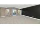 Light-filled main bedroom with neutral carpet, sliding doors to patio, and view at 1922 E Saltsage Dr, Phoenix, AZ 85048