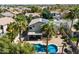 Aerial view showcases a backyard with a pool, patio, and solar panels at 2702 S Beverly Pl, Chandler, AZ 85286