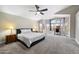 Spacious main bedroom with a large windows, sitting area, and plush carpeting at 2702 S Beverly Pl, Chandler, AZ 85286