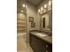 Tastefully designed bathroom featuring a tub, a vanity with double sinks, and unique tile work at 30556 N Sage Dr, Peoria, AZ 85383