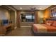 Relaxing primary bedroom with a king bed, a TV, and a picturesque desert view at 30556 N Sage Dr, Peoria, AZ 85383