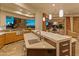 Beautiful kitchen featuring modern countertops, stainless steel sink, and a view into the dining area at 30556 N Sage Dr, Peoria, AZ 85383