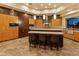 Modern kitchen with stainless steel appliances, pendant lighting, and a spacious island at 30556 N Sage Dr, Peoria, AZ 85383