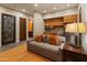 Comfortable living area with a kitchenette, sofa, and access to other rooms at 30556 N Sage Dr, Peoria, AZ 85383