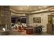Spacious living room featuring a fireplace, stylish decor, and seamless indoor-outdoor flow at 30556 N Sage Dr, Peoria, AZ 85383
