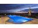 A luxurious swimming pool with desert landscaping and mountain views at 30556 N Sage Dr, Peoria, AZ 85383