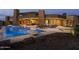 Stunning outdoor pool area with a built-in barbecue and well-appointed lounging space at 30556 N Sage Dr, Peoria, AZ 85383