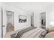 Neutral bedroom with large windows, ensuite bathroom, and walk-in closet at 33401 N 142Nd Way, Scottsdale, AZ 85262