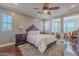 Serene main bedroom with neutral colors, a plush rug, and elegant furnishings for a relaxing retreat at 3432 E Jasper Dr, Gilbert, AZ 85296