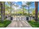 Community splash pad with palm trees and well maintained landscaping at 3432 E Jasper Dr, Gilbert, AZ 85296