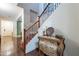 Entryway with staircase, hardwood floors, and a decorative antique chest at 3432 E Jasper Dr, Gilbert, AZ 85296