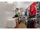 Walk-in closet offering ample storage with built-in shelves and hanging rods at 3432 E Jasper Dr, Gilbert, AZ 85296