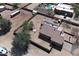 Aerial view showcasing the home's backyard featuring a trampoline and desert landscaping at 37509 N 7Th N St, Phoenix, AZ 85086
