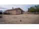 Exterior of home and backyard with pergola, desert landscaping at 37509 N 7Th N St, Phoenix, AZ 85086