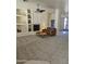 Spacious living room with fireplace, built-in shelving and neutral carpet at 37509 N 7Th N St, Phoenix, AZ 85086