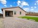 Manicured backyard featuring a covered patio and low-maintenance landscaping at 4336 N 93Rd Dr, Phoenix, AZ 85037