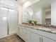 Bathroom features granite countertops, double sinks, and glass shower doors at 4336 N 93Rd Dr, Phoenix, AZ 85037