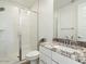 Bathroom includes glass shower, subway tile and granite counters at 4336 N 93Rd Dr, Phoenix, AZ 85037