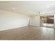 Bright living area featuring tile flooring and sliding glass doors to the backyard at 4336 N 93Rd Dr, Phoenix, AZ 85037